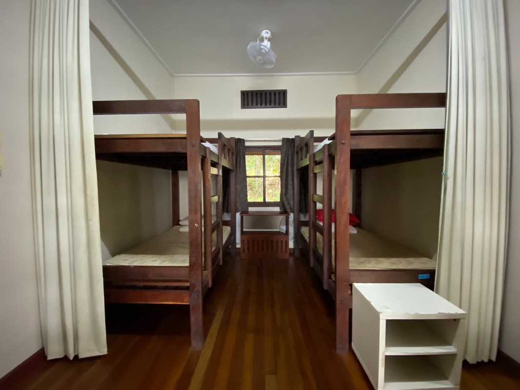 Dormitory bunks inside an interior camp